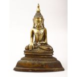 A GOOD INDIAN GILT BRONZE BUDDHA, seated in the meditative position, 20.5cm high, 15.5cm wide.