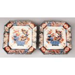 A GOOD PAIR OF 19TH CENTURY JAPANESE SQUARE FORM PORCELAIN CHARGERS, decorated in typical imari