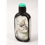 A GOOD 19TH / 20TH CENTURY CHINESE REVERSE PAINTED GLASS & OVERLAY SNUFF BOTTLE, decorated to depict