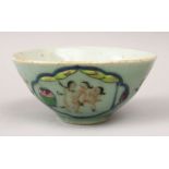 A 19TH CENTURY CHINESE CELADON PORCELAIN EROTIC SCENE BOWL, the body decorated with two erotic