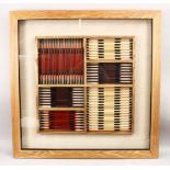 A LARGE 20TH CENTURY FRAMED ORIENTAL PICTURE OF PAINT BRUSHES / STICKS, 90cm square.