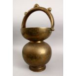 A LARGE 19TH / 20TH CENTURY PERSIAN BRASS HANDLED BASKET, with chased figural decoration and moulded