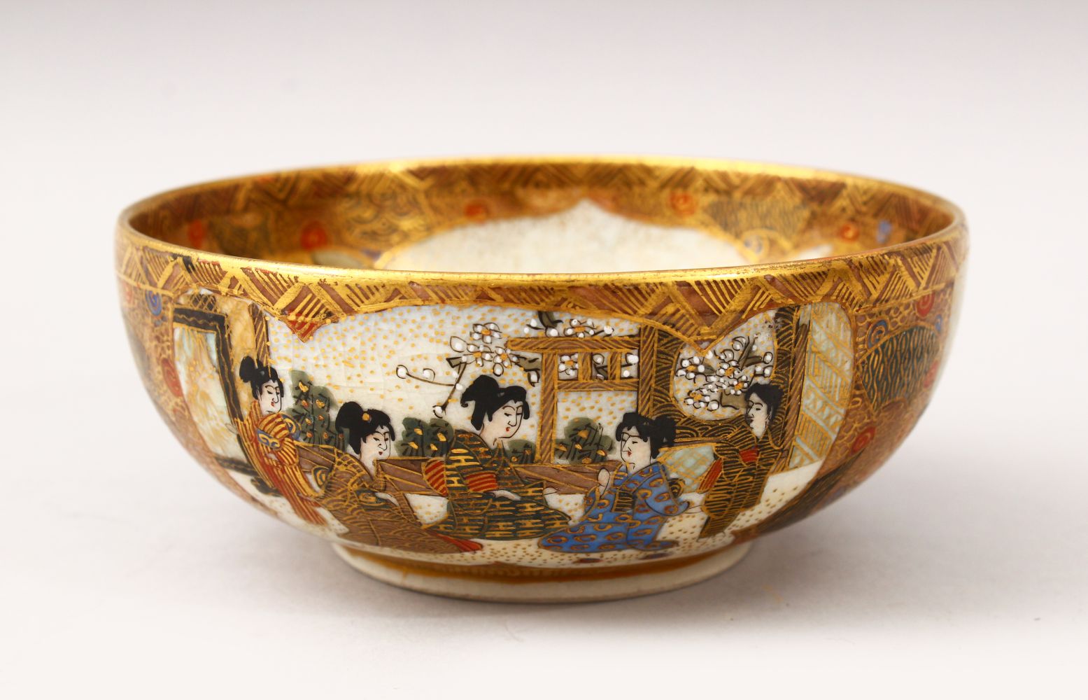 A JAPANESE MEIJI PERIOD SATSUMA IMMORTAL BOWL, the interior of the bowl decorated with scenes of