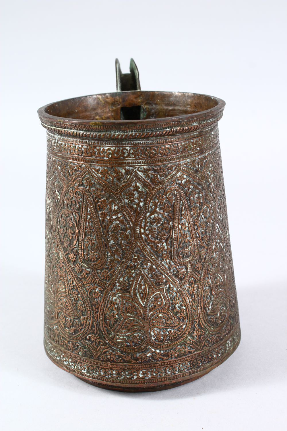 A 19TH CENTURY OR EARLIER INDO PERSIAN COPPERED BRASS SPOUTED JUG, with chased floral motiv - Image 4 of 5