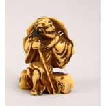 A JAPANESE MEIJI PERIOD CARVED IVORY NETUSKE OF A PREIST / SOTOBA KOMACHI, the netsuke depicting a