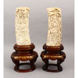 A VERY FINE PAIR OF JAPANESE MEIJI PERIOD CARVED IVORY & SHIBAYAMA TUSK VASES ON STANDS, each vase