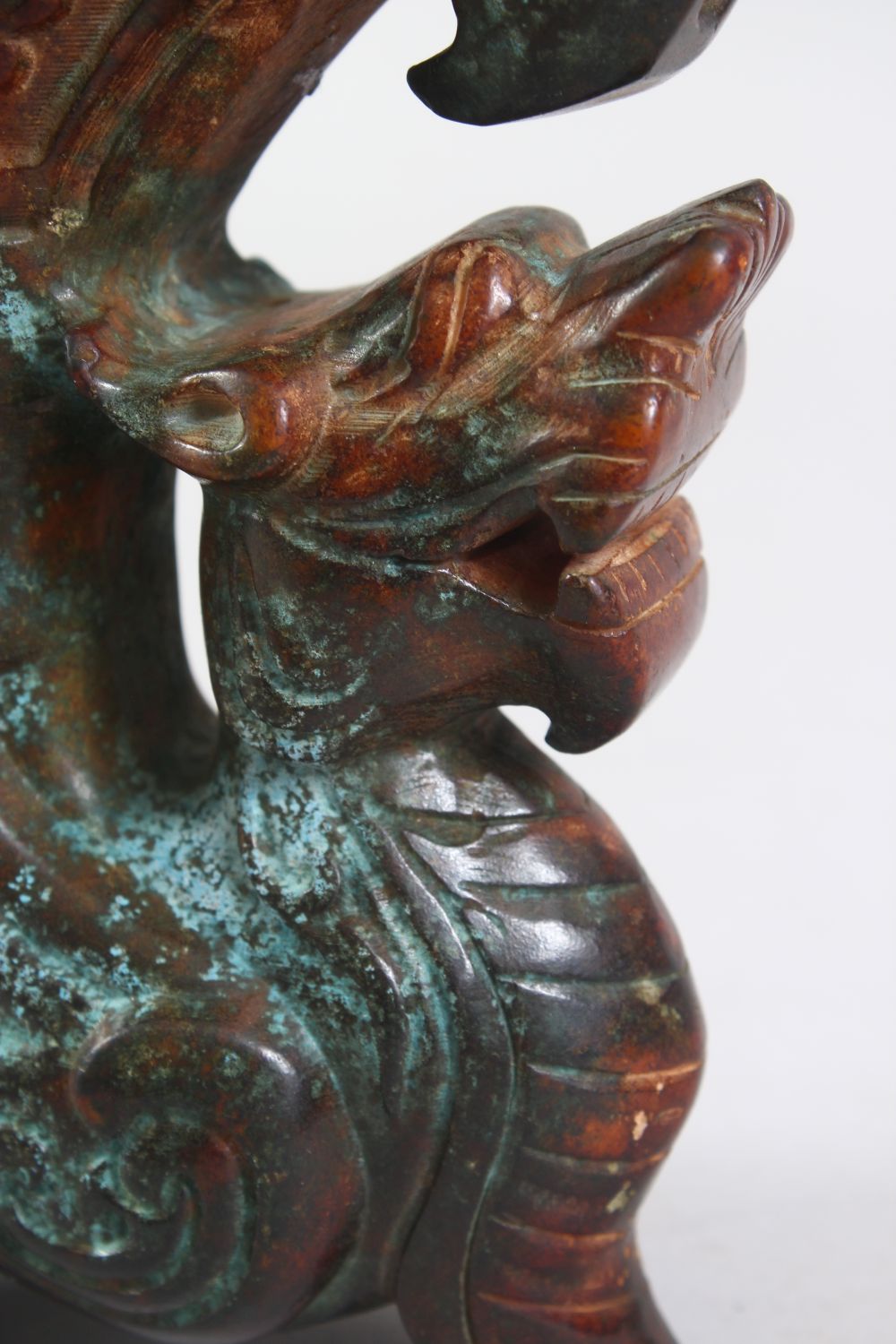 A 20TH CENTURY CHINESE ARCHAIC STYLE CARVED HARDSTONE EWER, the body carved as a dragon, the - Image 4 of 6