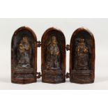 A CHINESE BRONZE FOLDING TRIPTYCH. 6ins high.