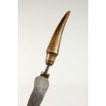 AN EDWARD OWEN OF SHEFFIELD CARVING KNIFE, with Rhino handle.