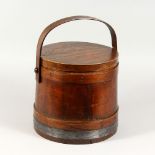 A SCANDINAVIAN PINE FOOD BUCKET, with lid and handle. 9.5ins high.