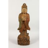 A CARVED WOOD FIGURE. 2ft high.