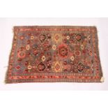 A PERSIAN BIDJAR RUG, EARLY 20TH CENTURY, Garous design, rust ground with stylised decoration. 5ft