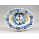 A CONTINENTAL OVAL MARRIAGE DISH, painted and initialled in blue. 11.5ins wide.