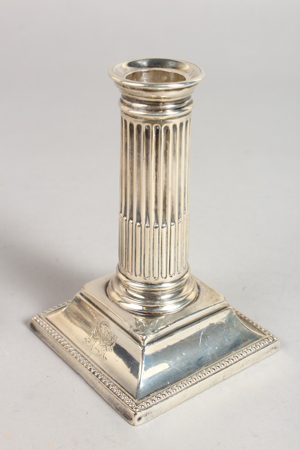 A VICTORIAN CANDLESTICK, with fluted columns, on a square base. 5ins high. Sheffield 1881. Maker: - Image 3 of 5