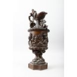 A GRAND TOUR MODEL 19TH CENTURY BRONZE CLASSICAL URN, decorated with cupids, acanthus and horses.