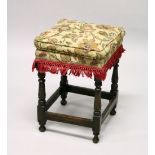 A SMALL 18TH CENTURY OAK SQUARE STOOL, with padded top and turned legs, with plain uniting