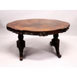 A VICTORIAN ROSEWOOD LIBRARY TABLE, with a shaped top, pair of turned and carved column supports