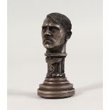 A REPRODUCTION NAZI BRONZE SEAL WITH BUST OF ADOLF HITLER