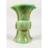 A CARVED GREEN JADE CHINESE ARABIC VASE.