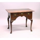 AN 18TH CENTURY OAK LOWBOY, with rectangular top, three frieze drawers with brass handles, on