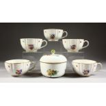 A SET OF FIVE LARGE MEISSEN CUPS, painted with flowers and butterflies, cross swords mark in blue