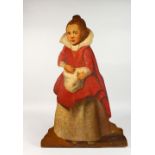 AN 18TH CENTURY STYLE DUMMY BOARD, painted as a young girl wearing a red and white dress. 36ins high