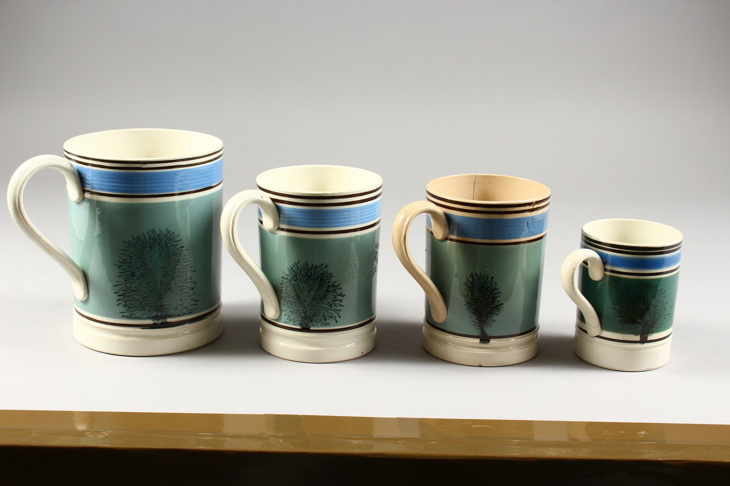 FOUR 19TH CENTURY MOCHA WARE TANKARDS, half pint, 2 x pint and a quart. - Image 11 of 20