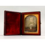 A SMALL DAGUERREOTYPE, in folding leather case. 2.75ins x 2.5ins.