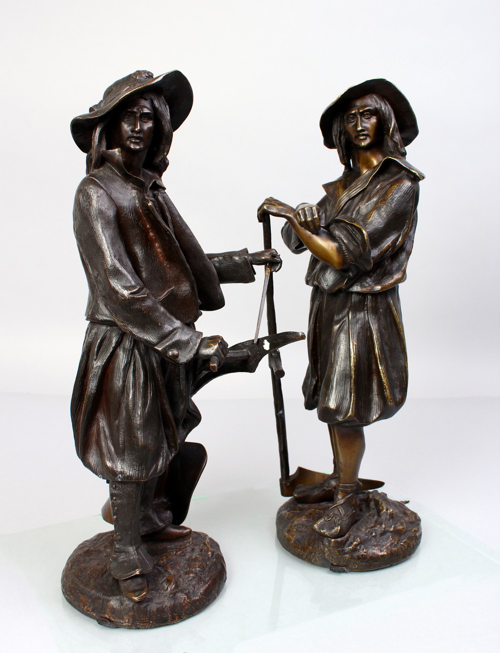 EMILE VICTOR BLAVIER (19TH CENTURY) FRENCH A RARE PAIR OF BRONZE FIELD WORKERS, one carrying a
