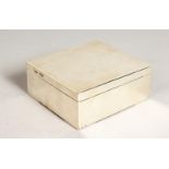 A PLAIN VICTORIAN SILVER CIGARETTE BOX. London 1889. 4ins.