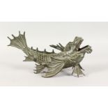 A CHINESE BRONZE DRAGON FISH. 12ins long.