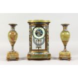 A GOOD FRENCH CHAMPLEVE ENAMEL AND ONYX THREE PIECE CLOCK GARNITURE. Clock: 12ins high. Side Pieces: