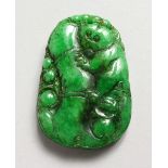 A CARVED JADE PENDANT.