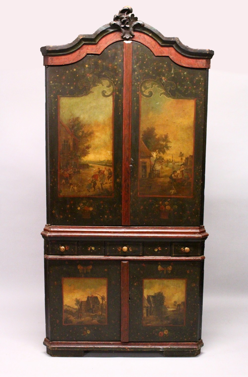 A GOOD 18TH CENTURY CONTINENTAL PAINTED PINE CORNER CUPBOARD, with a shaped and carved cornice,