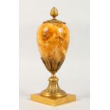 A VERY GOOD ORMOLU MOUNTED FELSPAR EGG SHAPED PIECE, with pineapple finial and fruiting vines on a