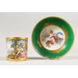 A GOOD SEVRES CUP AND SAUCER, the cup painted with young lovers, the saucer painted with cupid.