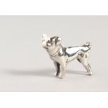 A TINY NOVELTY SILVER DOG.