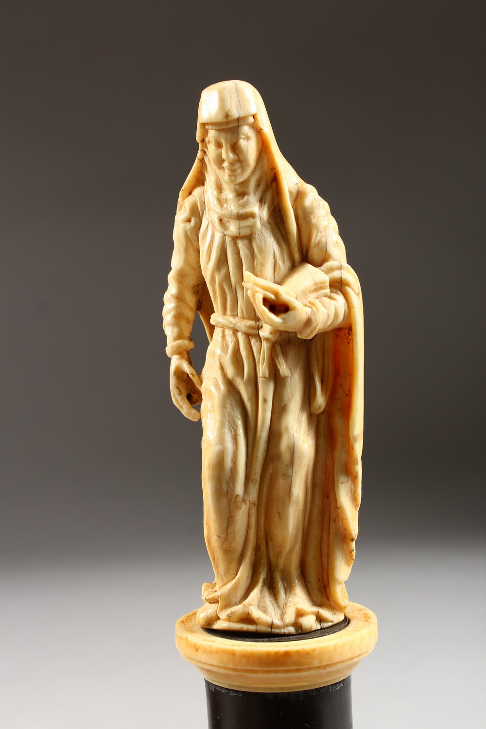 A 19TH CENTURY IVORY FIGURE ON STAND, possibly St Anne; together with a small ivory in a gilt frame. - Image 4 of 7