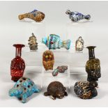A COLLECTION OF TWELVE ROMAN/EGYPTIAN-STYLE DECORATIVE GLASS ANIMAL FIGURES AND MASKS.