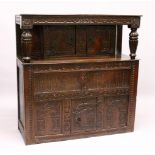 A VERY GOOD EARLY 17TH CENTURY OAK COURT CUPBOARD, Dated 1641, the front profusely carved with