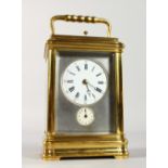 A 19TH CENTURY FRENCH GRANDE SONNERIE, PETITE SONNERIE CARRIAGE CLOCK, masked dial and alarm. 5.5ins