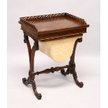 A VICTORIAN WALNUT WORK TABLE, with galleried top over a single drawer and work bag, on curving