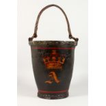 AN EARLY LEATHER BUCKET, painted with a crown and the letter A. 12ins high.
