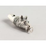 A NOVELTY SILVER DOG'S HEAD WHISTLE.