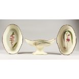 A PAIR OF CREAMWARE OVAL BOTANICAL DISHES, "Dwarf Almond" and "Tubular Rooted (Flower)", and A