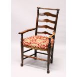 A GOOD 18TH CENTURY OAK LADDER BACK ARMCHAIR, with rushwork seat.