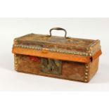 A 19TH CENTURY BRASS STUDDED PONY SKIN COVERED BOX. 12ins wide.