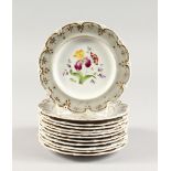 A SET OF TWELVE BOTANICAL PORCELAIN PLATES, painted with flowers and butterflies. 6ins diameter.