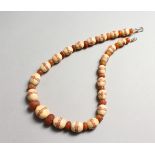 A SET OF IVORY PAINTED BEADS NECKLACE.