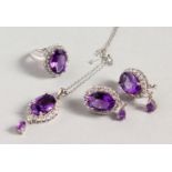 A SILVER AND AMETHYST SET, EARRINGS, PENDANT AND RING.